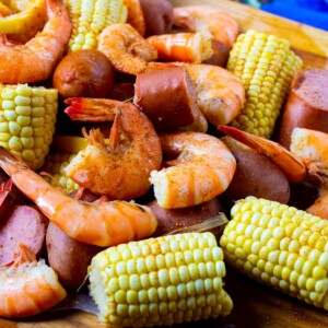 Slow Cooker Low Country Boil spread out on a table.