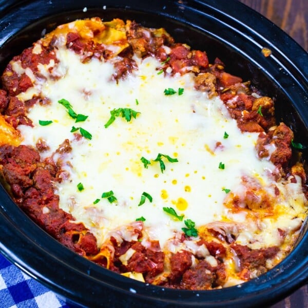 Sausage Lasagna in a black slow cooker.