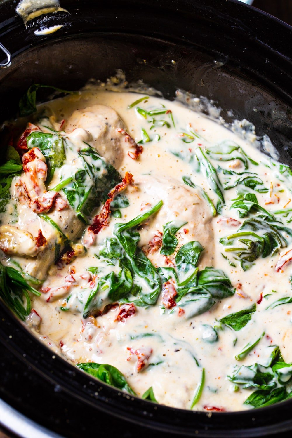 Creamy Tuscan Chicken in slow cooker.