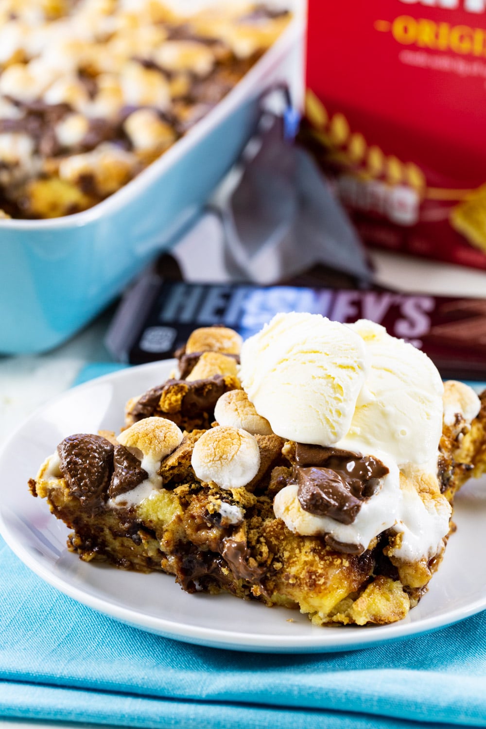 S'mores Bread Pudding topped with vanilla ice cream.