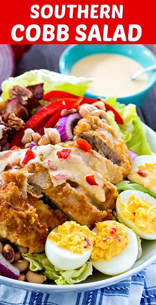 Southern Cobb Salad with fried chicken, black-eyed peas, deviled eggs, and pecans.