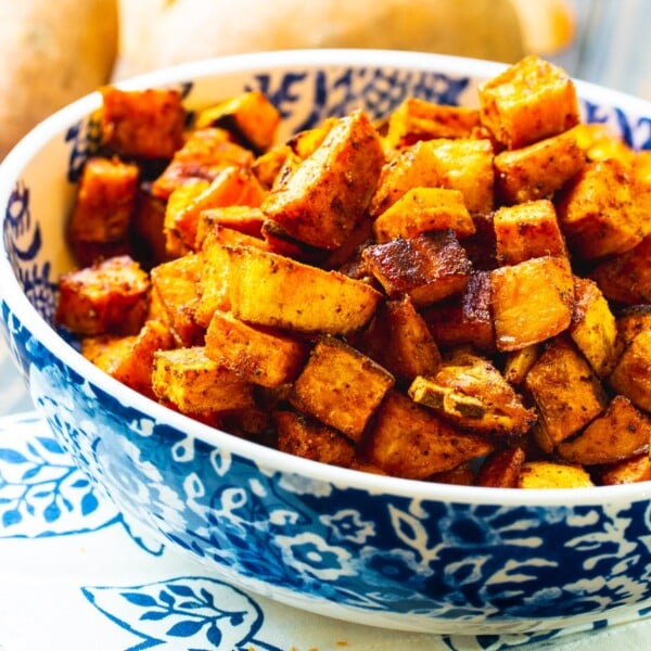 Bowl full of Spicy-Sweet Roasted Sweet Potatoes