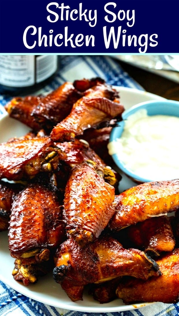 Chicken Wings with Sticky Soy Glaze on a plate with a bowl of ranch dressing.
