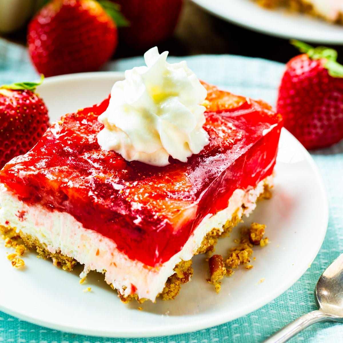 Slice of Strawberry Pretzel Salad connected  a plate.