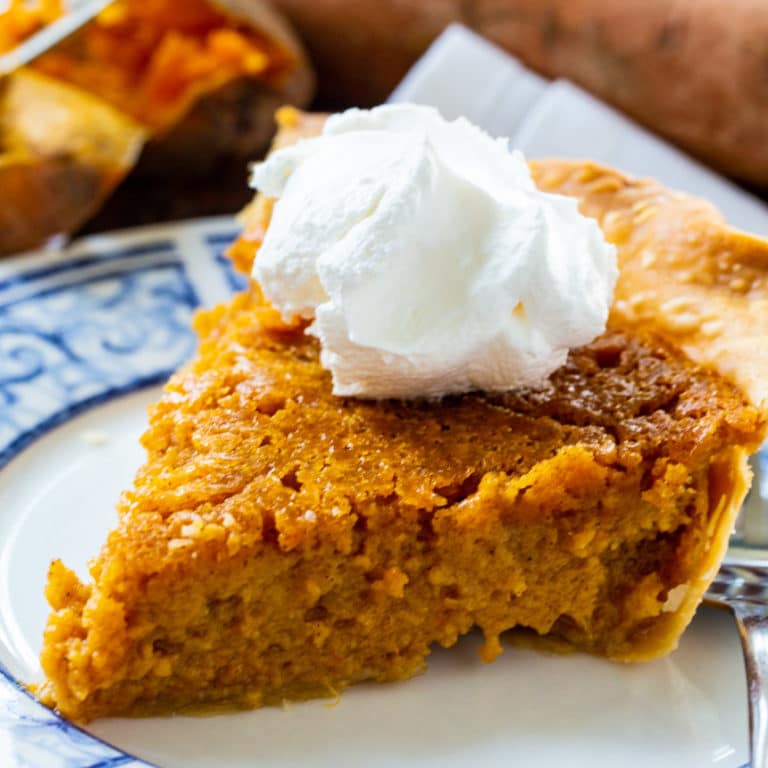 Slice of Sweet Potato Pie on a small plate.