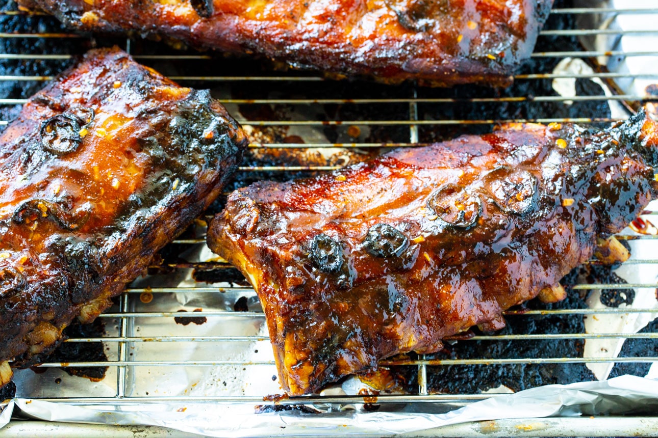 Babay Back Ribs on a wire rack.