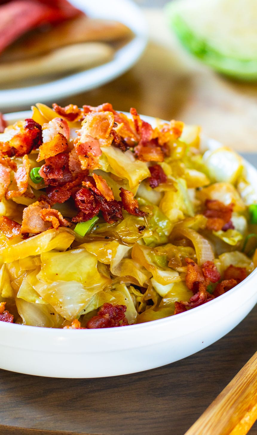 Sweet and Sour Cabbage with Bacon in a white bowl.