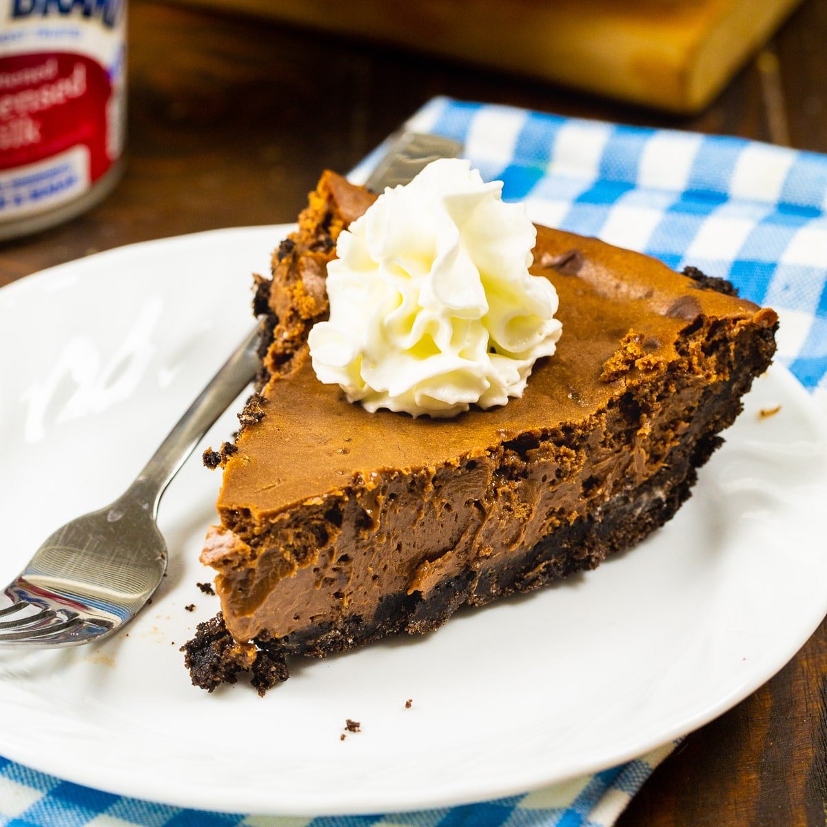 Slice of Sweetened Condensed Milk Chocolate Pie on a plate.