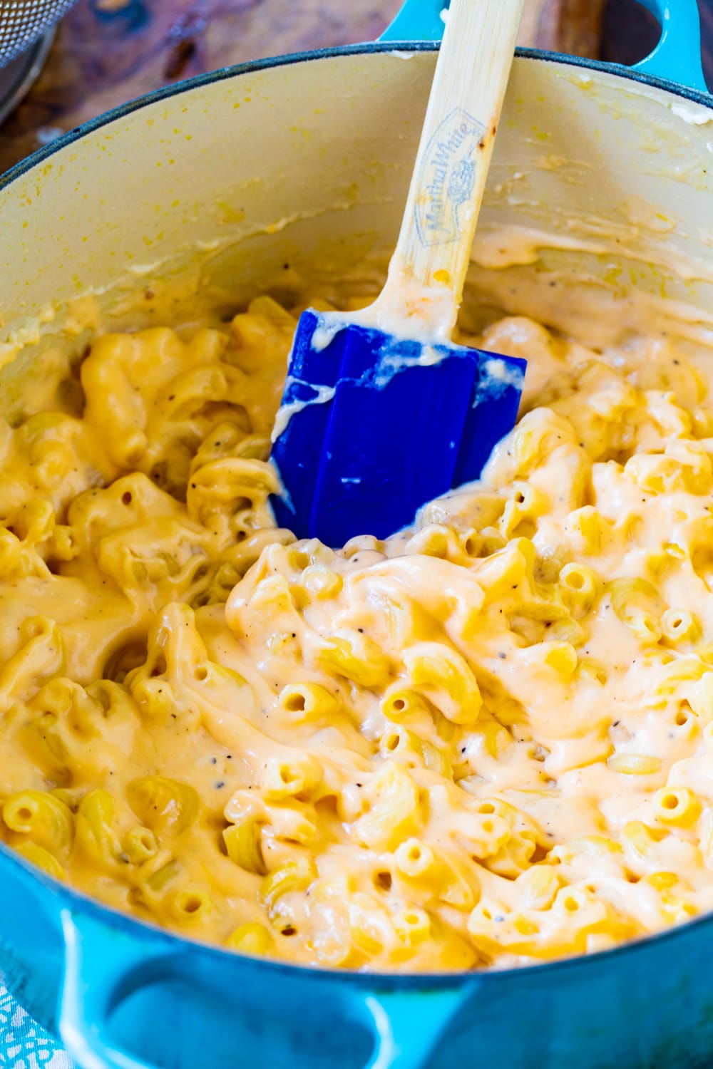 Mac and Cheese in a large blue dutch oven.
