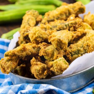 Whole Fried Okra in a metal tin.