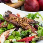 Apple and Pear Salad with Maple Pecan Bacon and Cranberry Vinaigrette. Such a delicious fall salad!