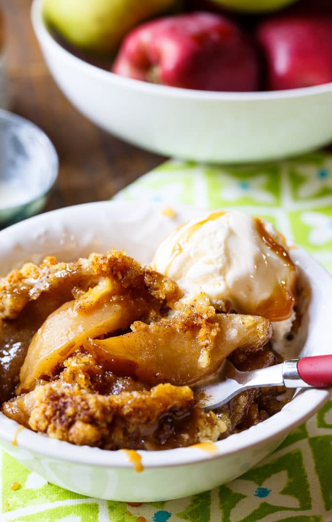 Slow Cooker Apple Cobbler. Serve with vanilla ice cream for a delicious fall dessert.