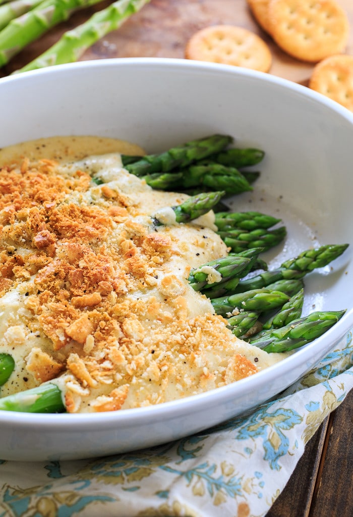 Asparagus Mornay- tender asparagus stalks covered in a cheesy sauce and crushed Ritz crackers. Perfect for Easter brunch.