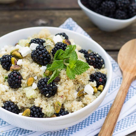 Blackberry Quinoa Salad in a white bowl with fresh mint.