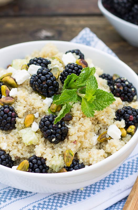 Blackberry Quinoa Salad in a bowl topped with fresh mint.