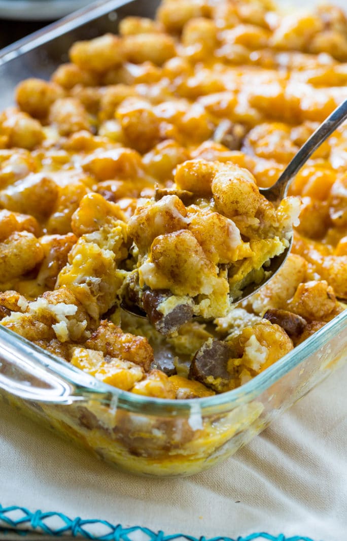 Breakfast Tater Tot Casserole with sausage and cheddar cheese.