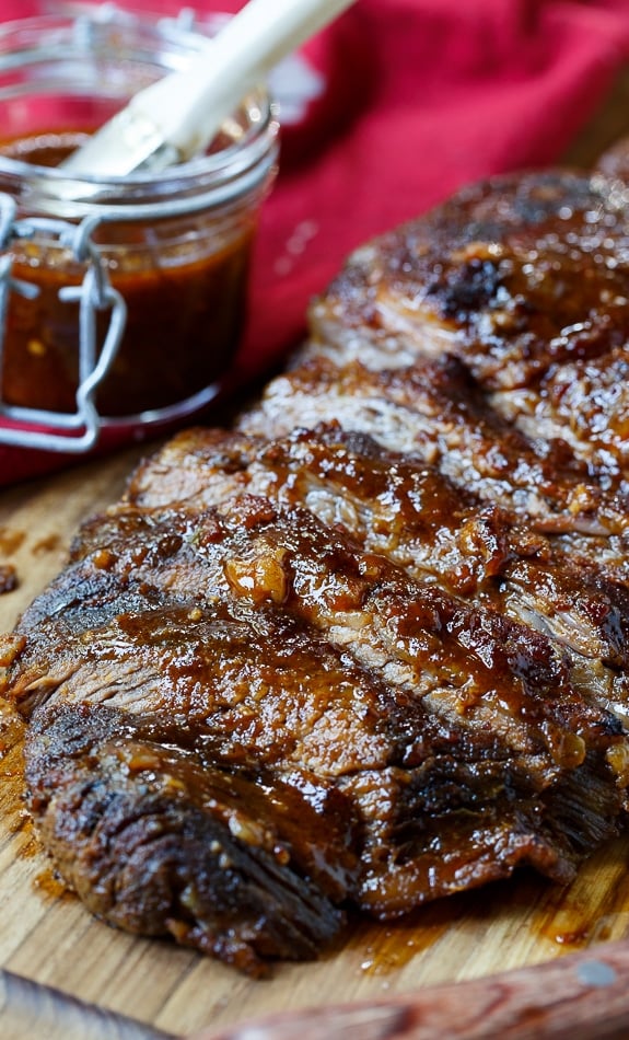 Oven-Barbecued Beef Brisket recipe from Cook's Illustrated. Wrapped in bacon for smokiness. The best brisket cooked in the oven you will ever taste!
