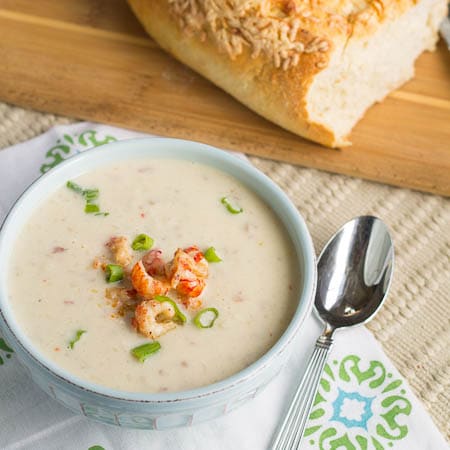 Crawfish Cauliflower Soup in a bowl with fresh bread.