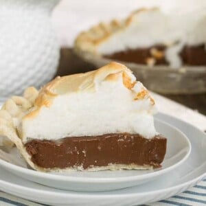 Old-Fashioned Chocolate Meringue Pie slice on a white plate.