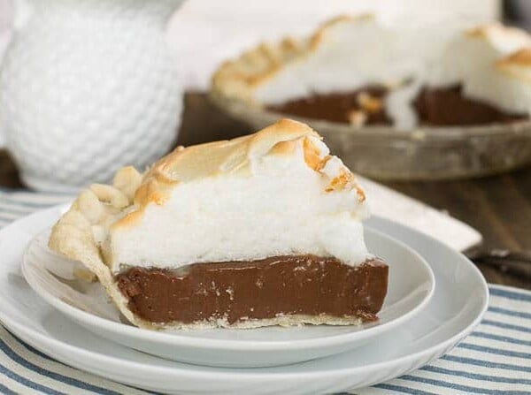 Old-Fashioned Chocolate Meringue Pie slice on a white plate.