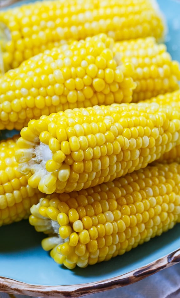 Best Way to Cook Corn - boiled with a cup of milk and a stick of butter. Most delicious corn ever!