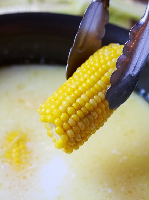 Best Way to Cook Corn - boiled with a stick of butter and a cup of milk. Most delicious corn ever!