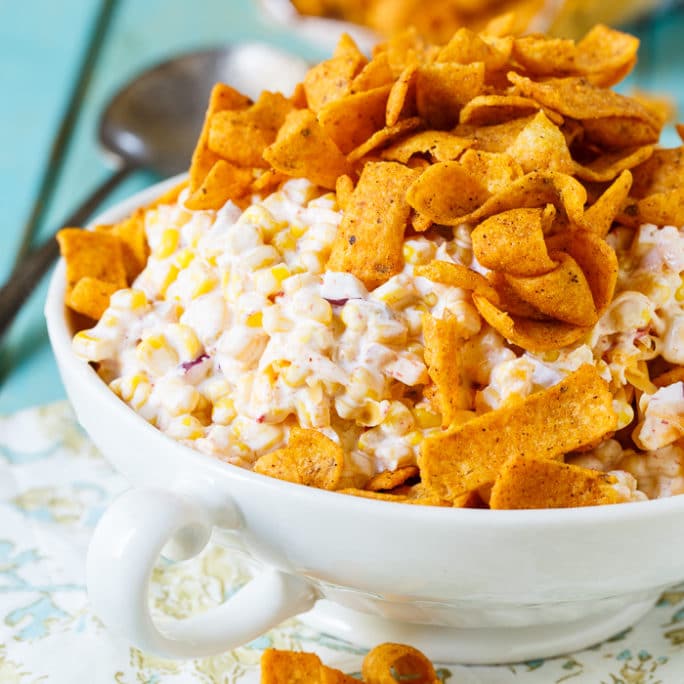 Frito Corn Salad is positively addicting. Perfect for potlucks, picnics, and cookouts.