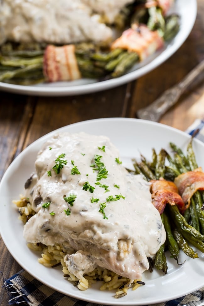 Creamy Crock Pot Chicken cooks up super tender with tons of flavor from ranch seasoning and cream cheese.