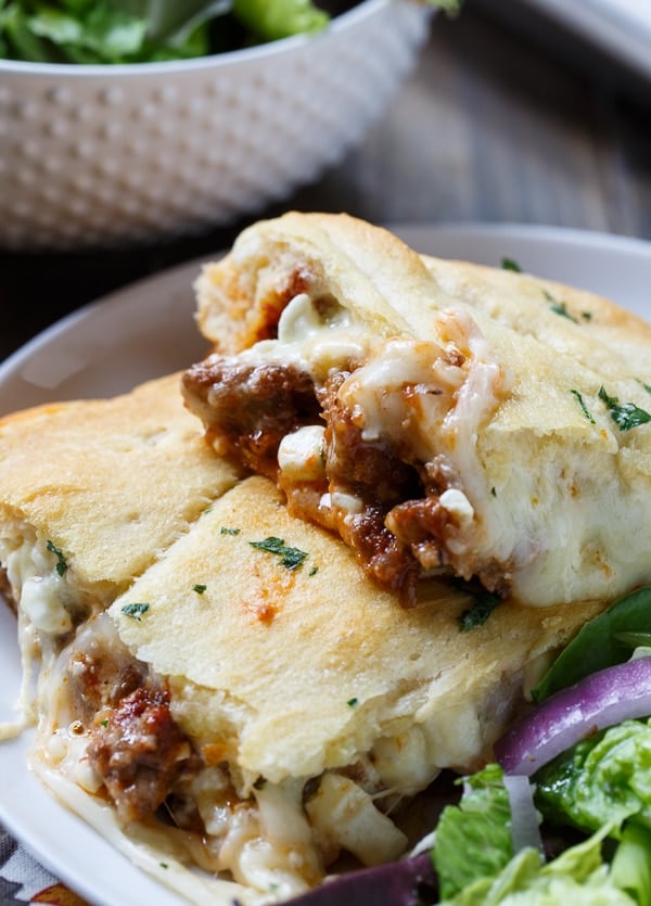 Crescent Lasagna makes an easy weeknight meal. Meat sauce and lots of cheese is sandwiched between crescent roll dough.
