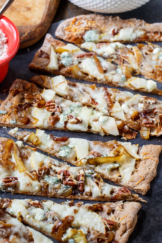 Cheesy Caramelized Onion Flatbread with pears, blue cheese, and pecans.