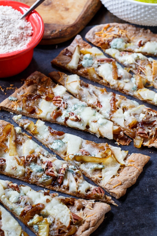 Cheesy Caramelized Onion Flatbreads with pears, blue cheese, and pecans.