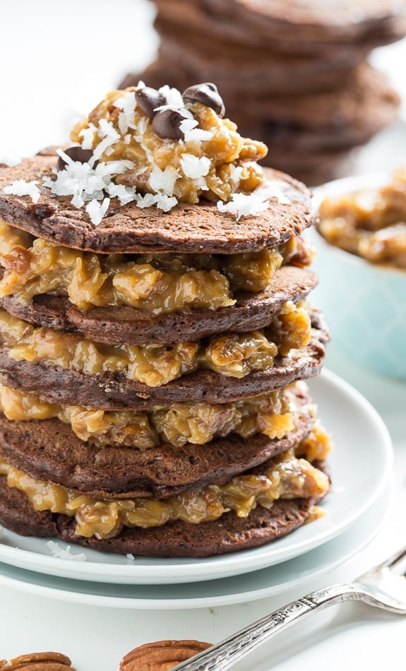 Southern Living's German Chocolate Pancakes. Chocolate pancakes layered with a thick coconut-pecan filling. Insanely delicious!