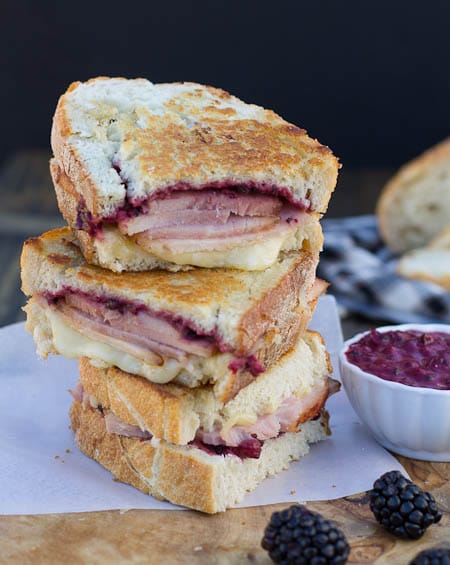 Ham Panini with Blackberry Mustard sliced in half and stacked.