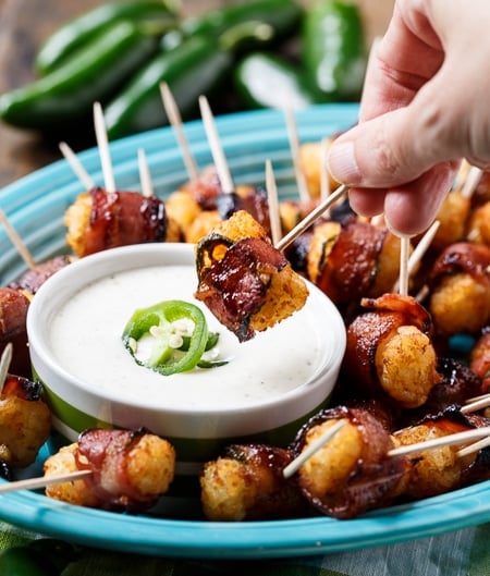 Bacon-Wrapped Jalapeno Tater Tots with ranch dip.