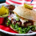 Southern BBQ Pork Burgers with creamy coleslaw and BBQ sauce.