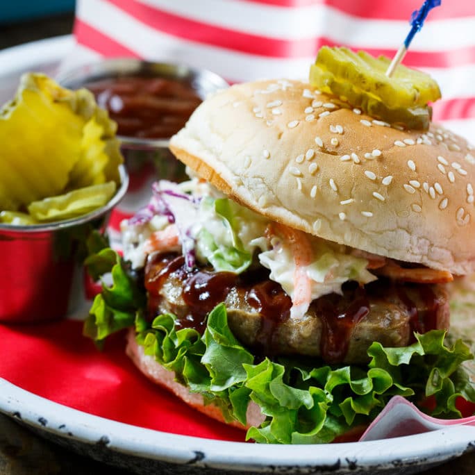 Southern BBQ Pork Burgers with creamy coleslaw and BBQ sauce. 