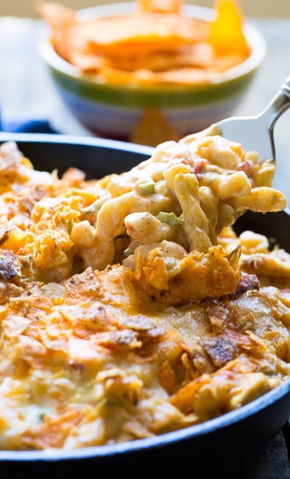 King Ranch Casserole in mac and cheese form! Creamy and spicy, with diced chicken and a crushed dorito topping!