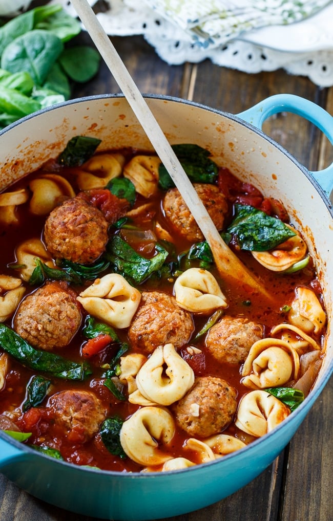 Meatball and Tortellini Soup with spinach.