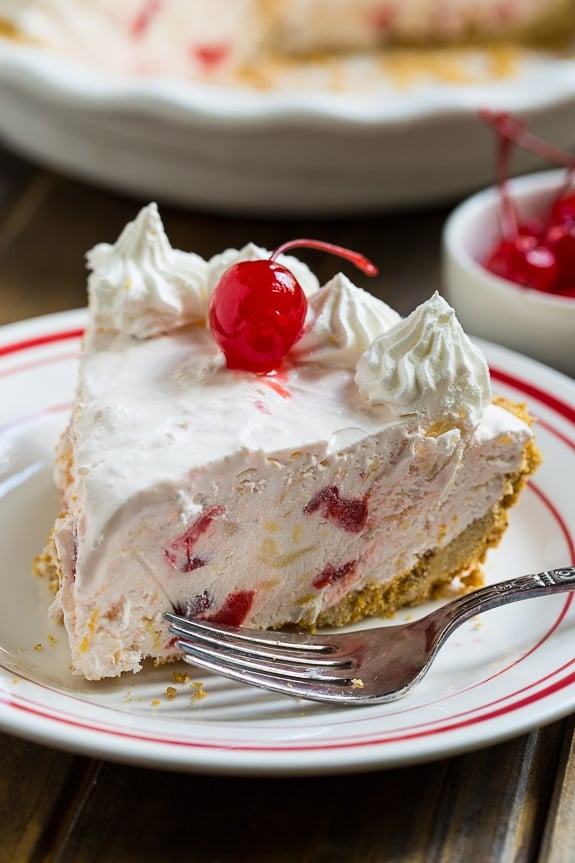 Millionaire Pie - fiull of pineapple, pecans, and maraschino cherries. This no-bake pie only takes a few minutes to prepare.