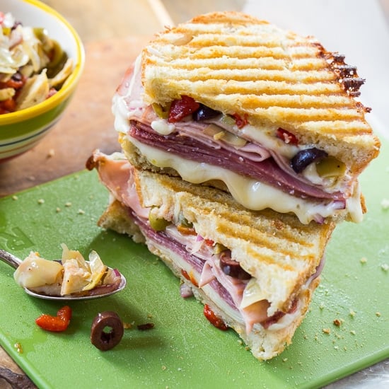 Muffaletta Panini with 3kinds of meat, provolone cheese, and olive relish.