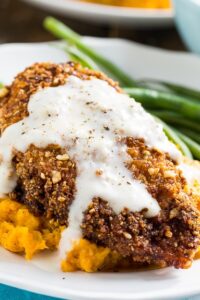 Nutty Fried Chicken with Smashed Sweet Potatoes and Milk Gravy.