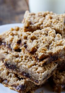 Oatmeal Carmelitas - chocolate chips and caramel sauce sandwiched between layers of oatmeal cookie dough.