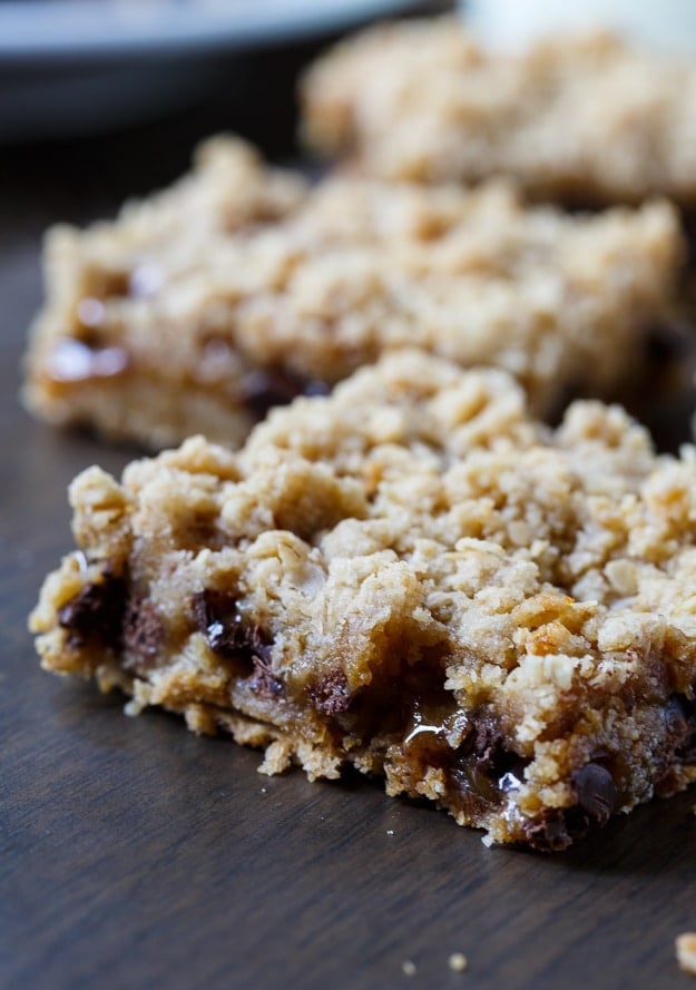Oatmeal Carmelitas - chocolate chips and caramel sauce sandwiched between oatmeal cookie layers.
