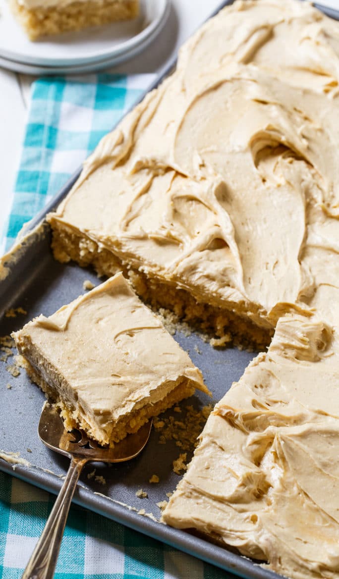 Peanut Butter Sheet Cake with a fluffy peanut butter frosting. Love this for potlucks!