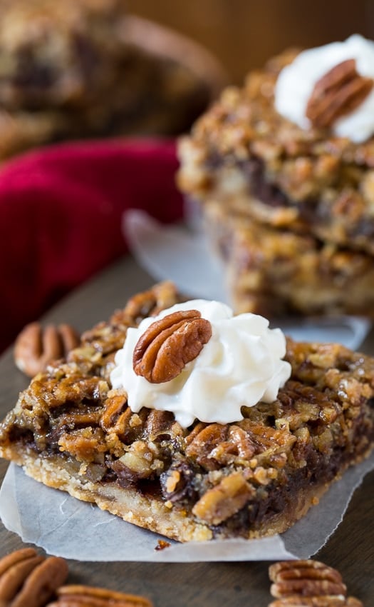 Chocolate Chip Pecan Pie Bars - all the flavor of a pecan pie in easy to eat bar form.