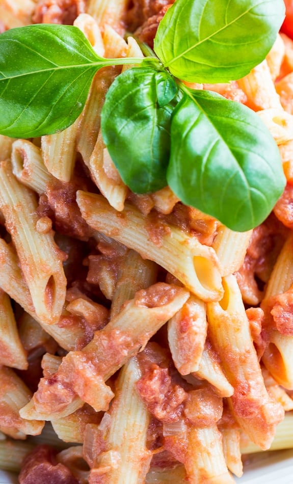 Close-up of Penne Alla Vodka with fresh basil