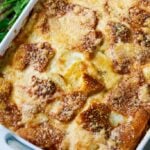 Scalloped Potato Casserole- a layer of bread slices and cheese on top makes a super crispy and golden topping!