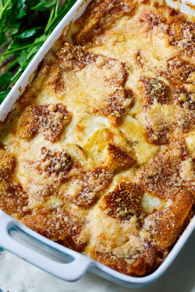 Scalloped Potato Casserole- a layer of bread slices and cheese on top makes a super crispy and golden topping!