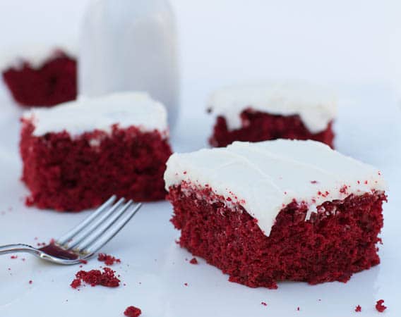 Multiple slices of red velvet cake.