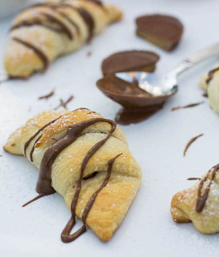 Crescent Rolls drizzled with chocolate.